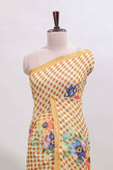 Yellow checked floral design linen cotton saree with self zari border and matching blouse