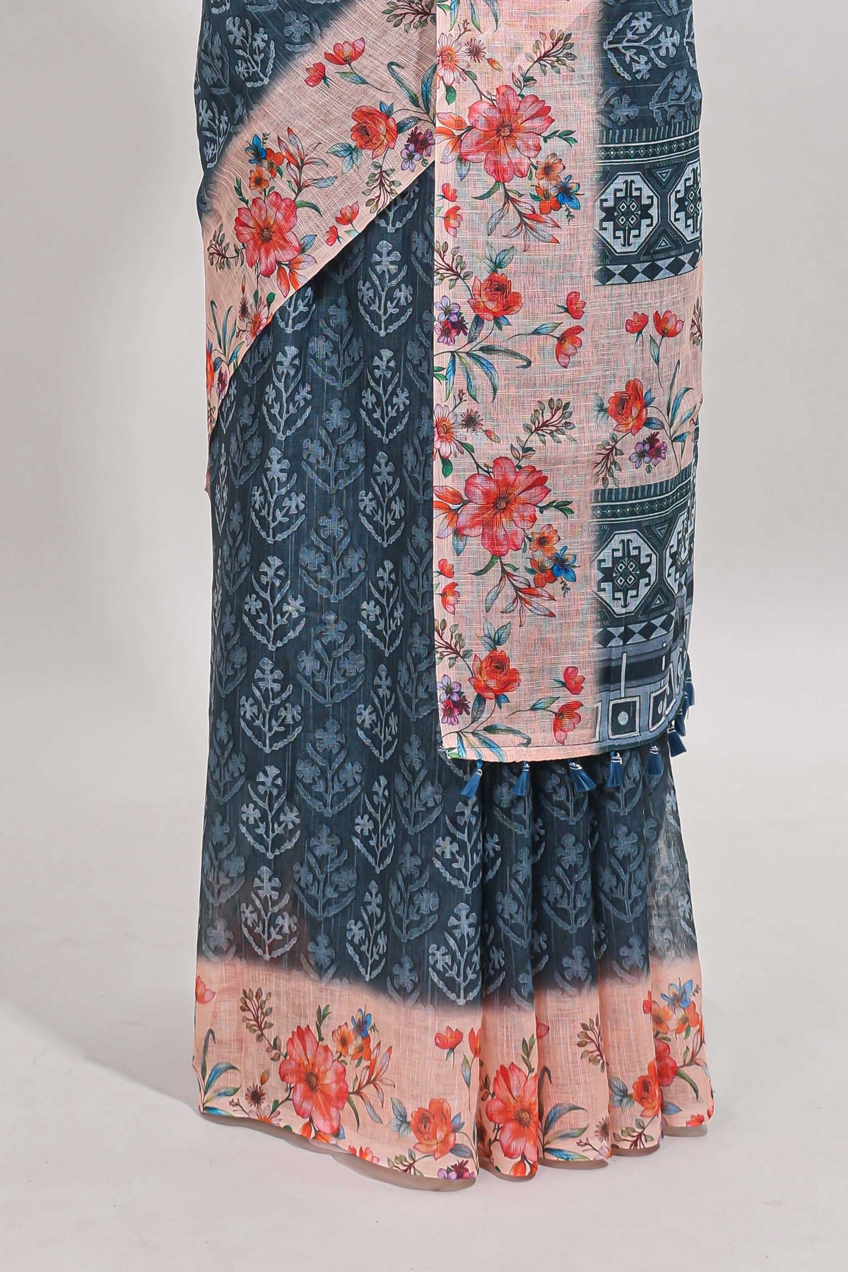 Midnight green floral design linen cotton saree with contrast floral design border and matching blouse