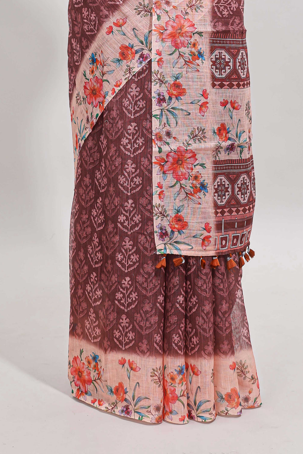 Brown floral design linen cotton saree with contrast floral design border and matching blouse