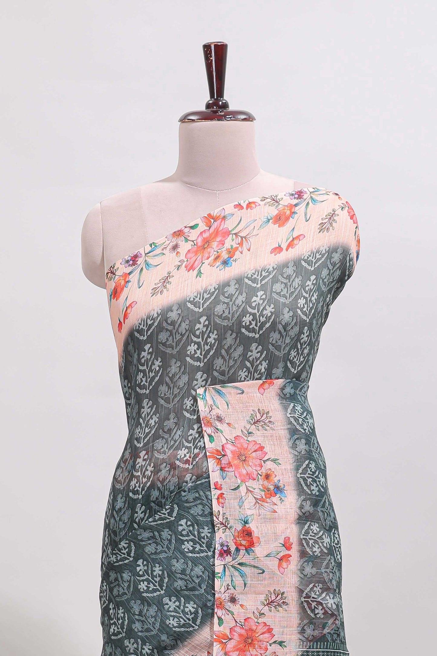 Green floral design linen cotton saree with contrast floral design border and matching blouse
