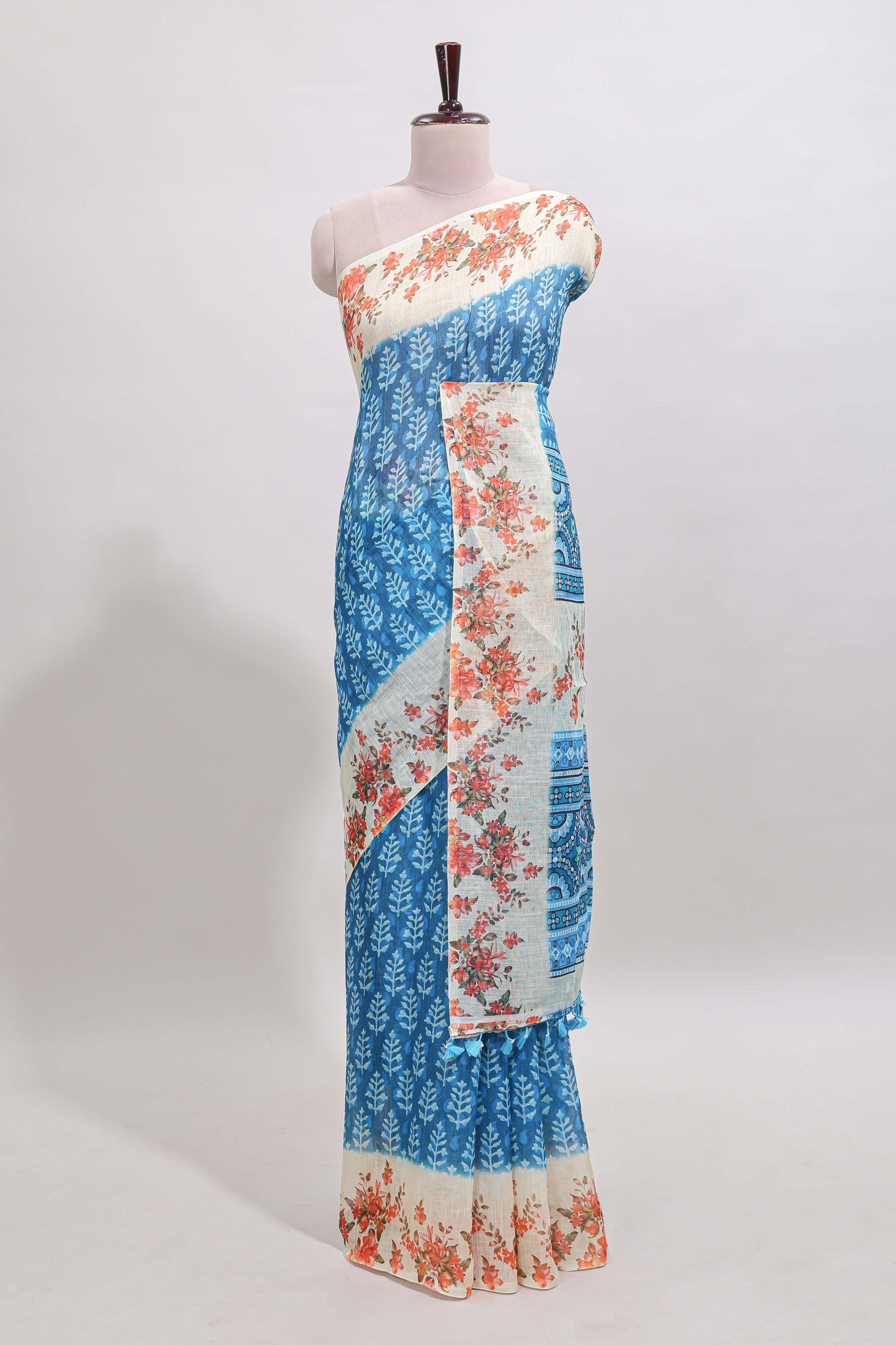 Blue leaf design linen cotton saree with contrast floral design border and matching blouse