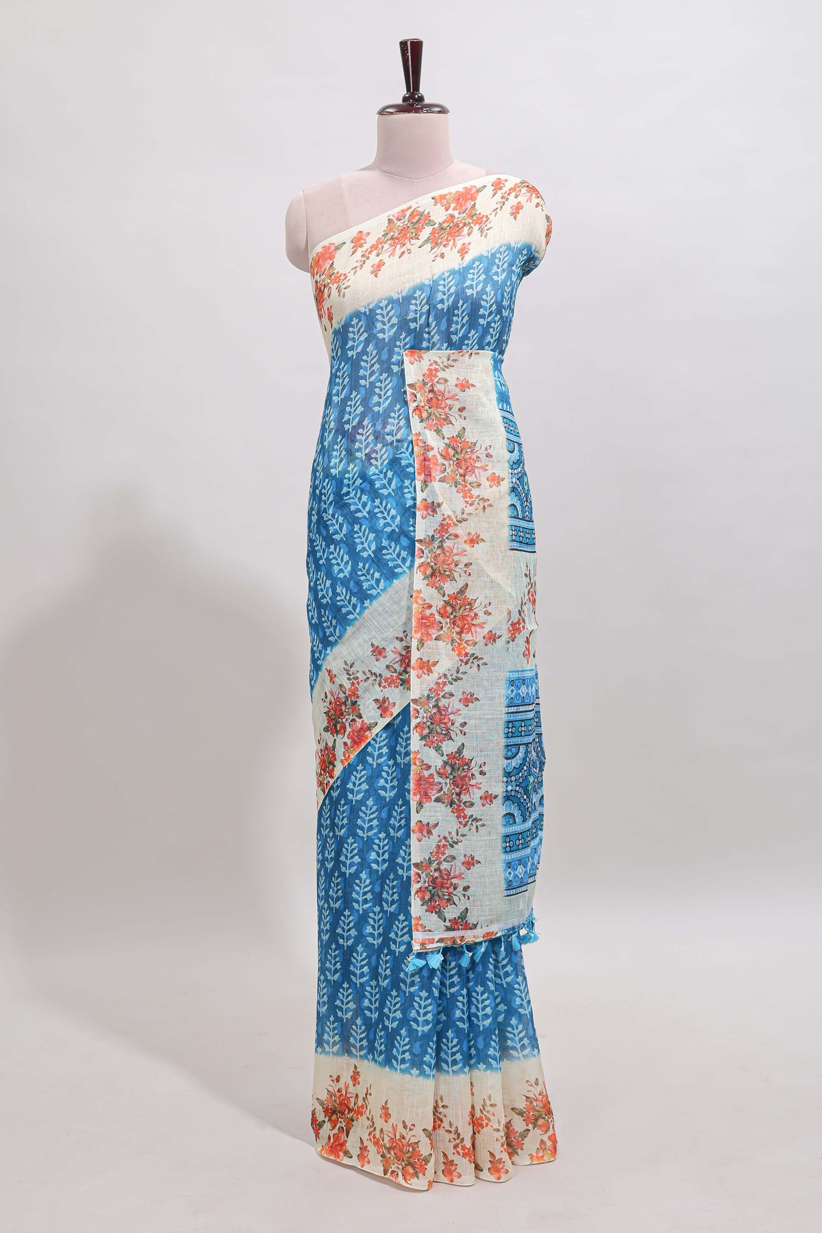 Blue leaf design linen cotton saree with contrast floral design border and matching blouse