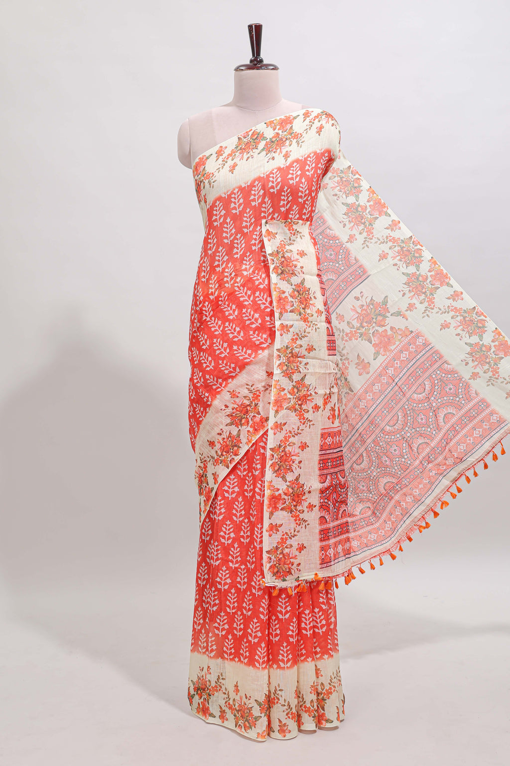 Orange leaf design linen cotton saree with contrast floral design border and matching blouse