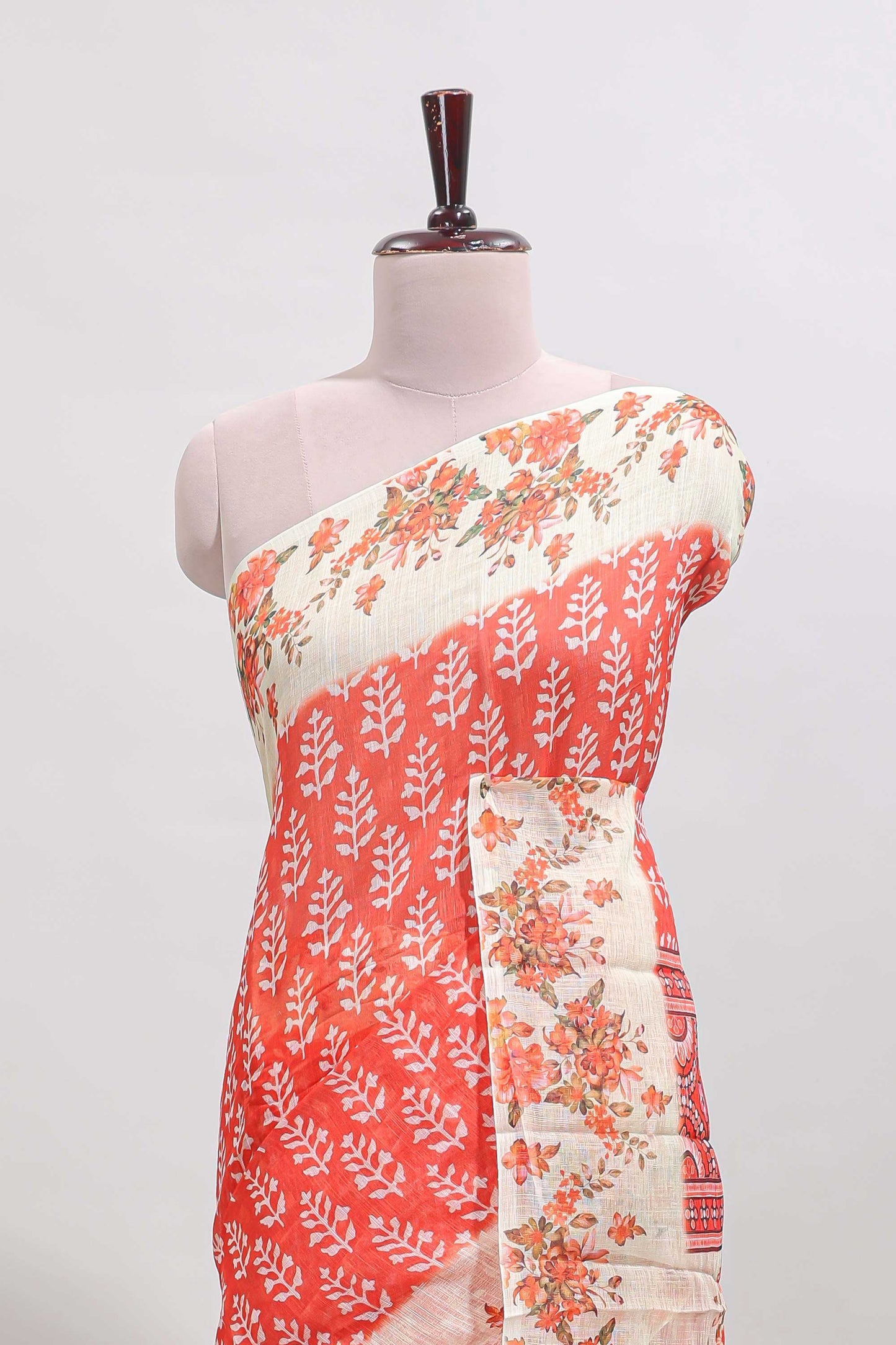 Orange leaf design linen cotton saree with contrast floral design border and matching blouse