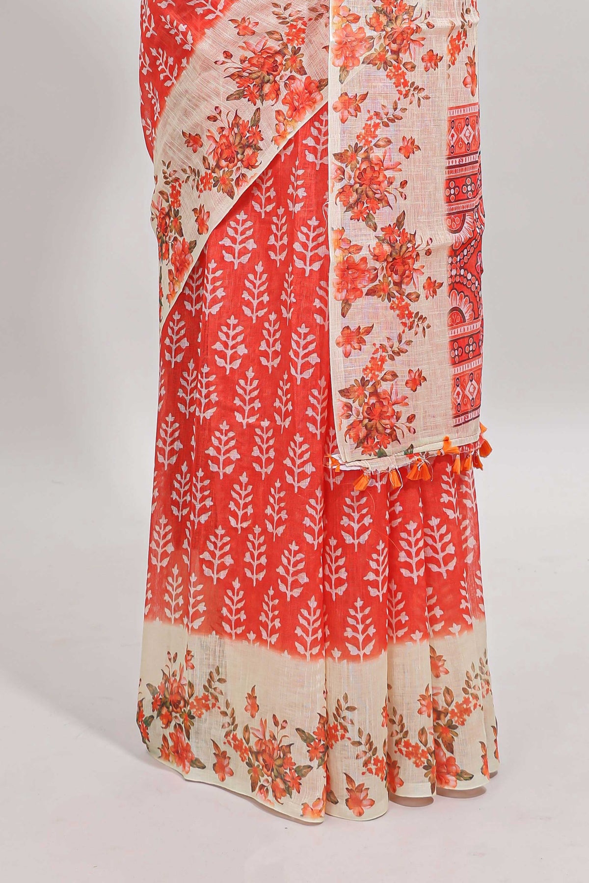 Orange leaf design linen cotton saree with contrast floral design border and matching blouse