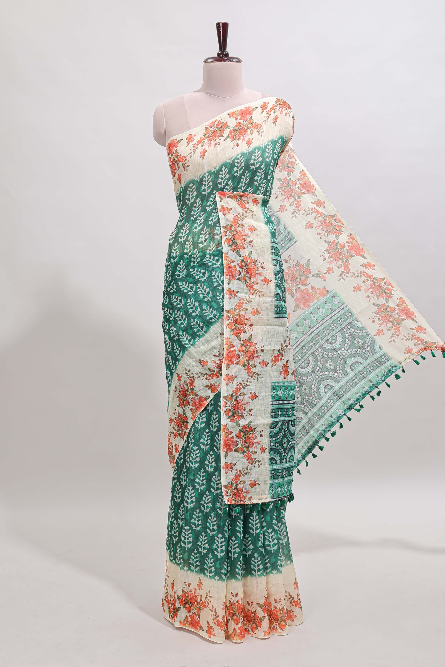 Green leaf design linen cotton saree with contrast floral design border and matching blouse
