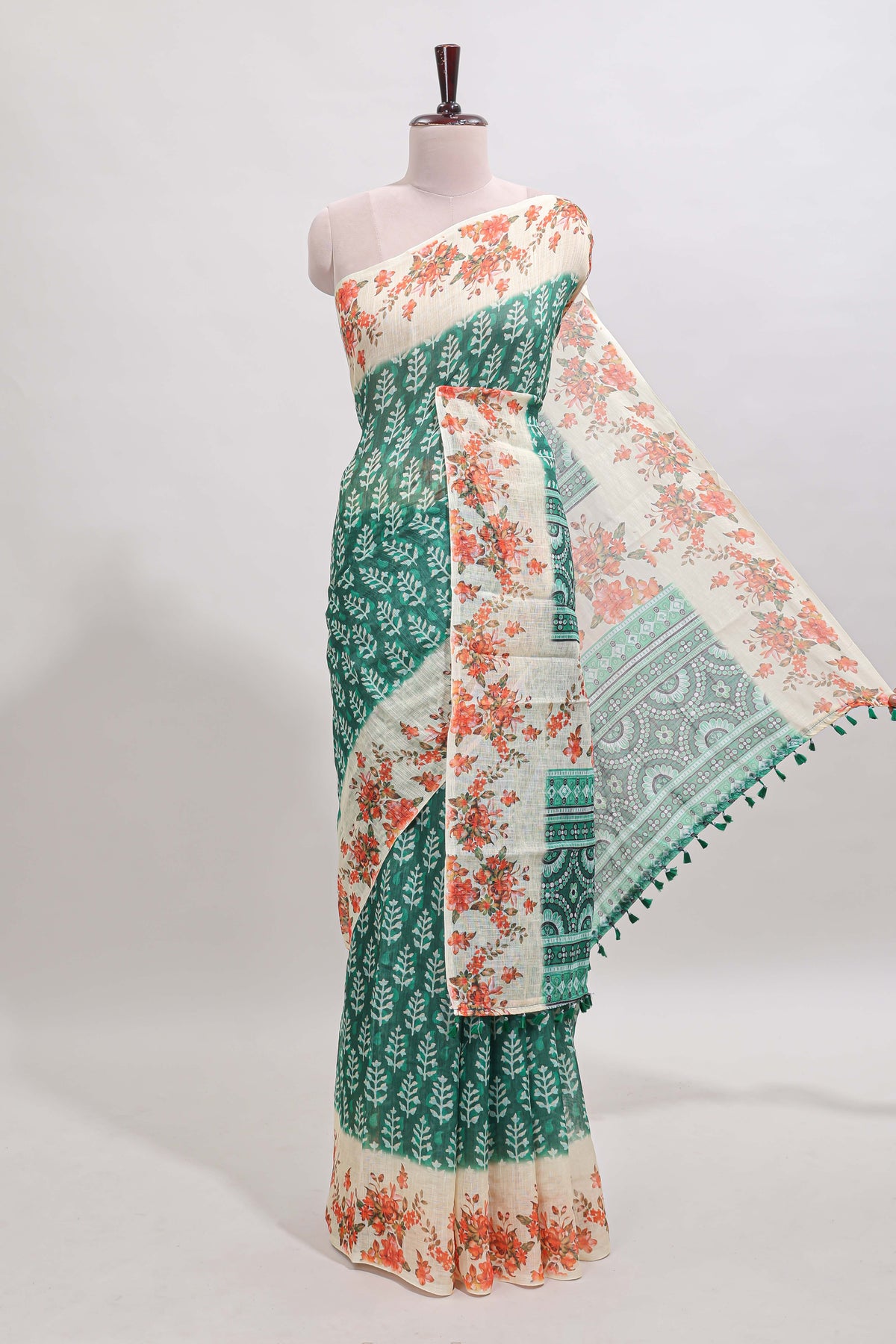 Green leaf design linen cotton saree with contrast floral design border and matching blouse