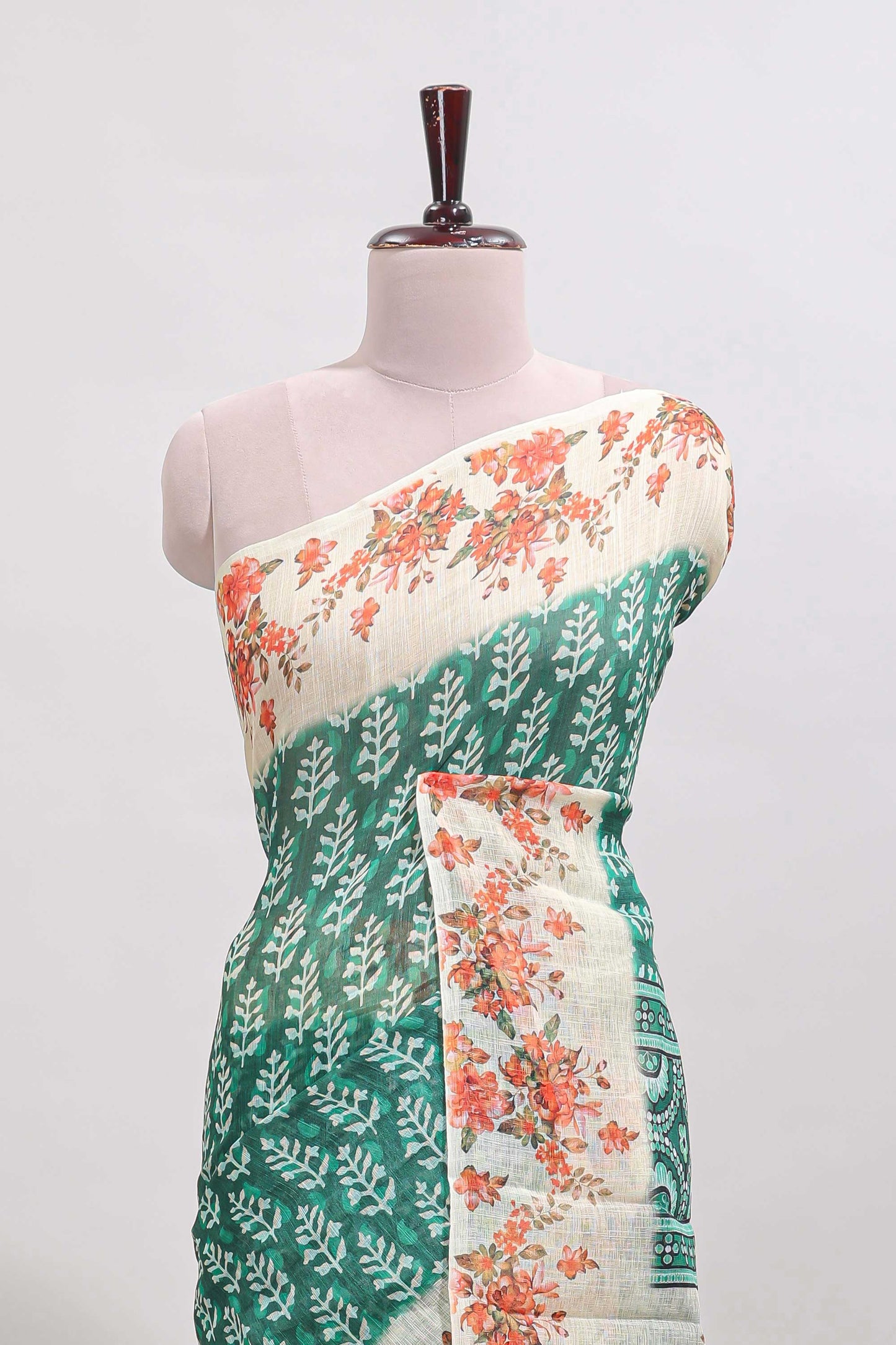 Green leaf design linen cotton saree with contrast floral design border and matching blouse