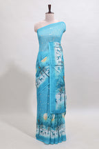 Turquoise blue winter themed linen cotton saree with self border and matching blouse