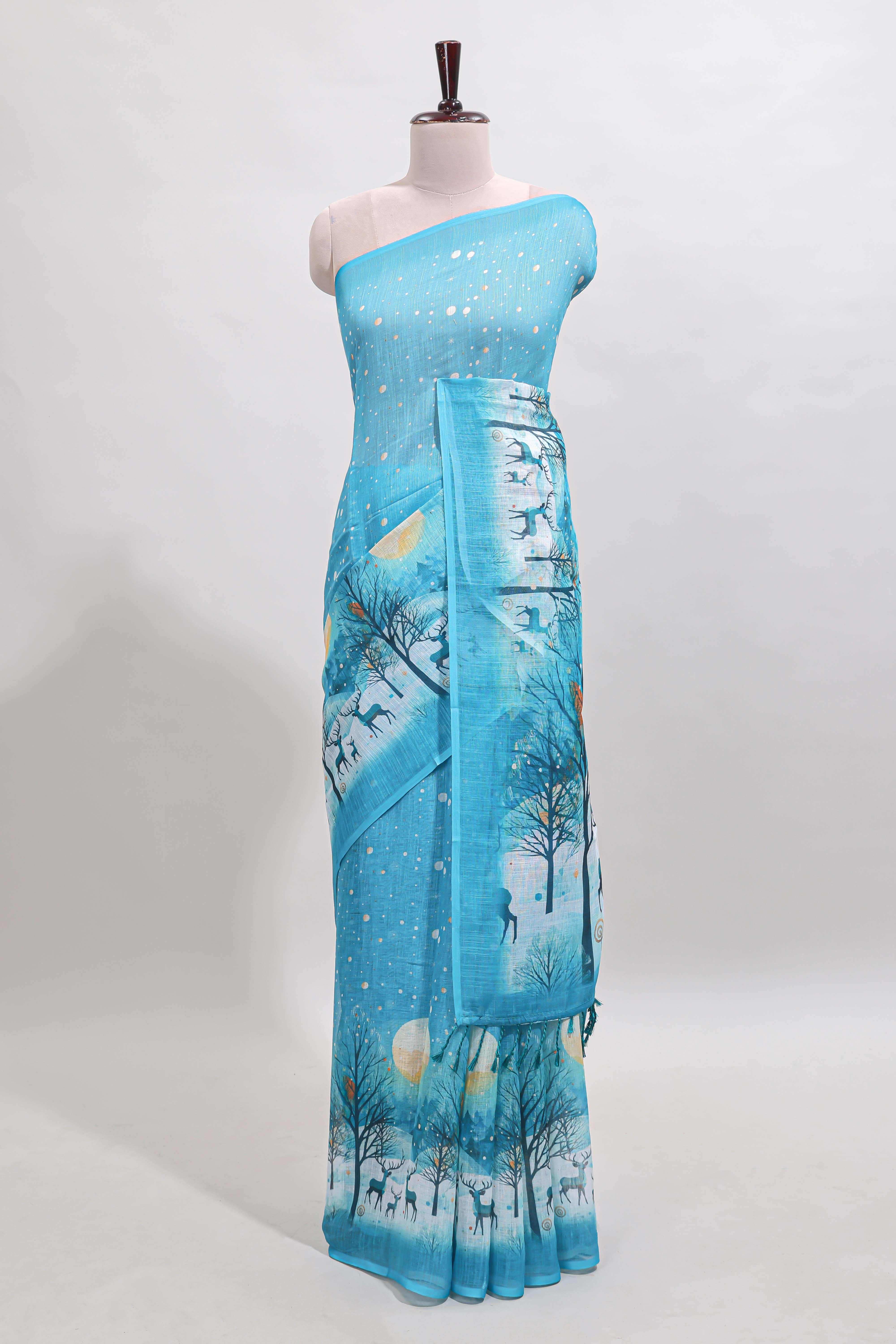 Turquoise blue winter themed linen cotton saree with self border and matching blouse