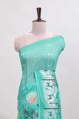 Turquoise green winter themed linen cotton saree with self border and matching blouse