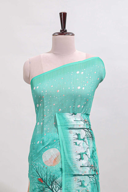 Turquoise green winter themed linen cotton saree with self border and matching blouse