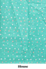 Turquoise green winter themed linen cotton saree with self border and matching blouse