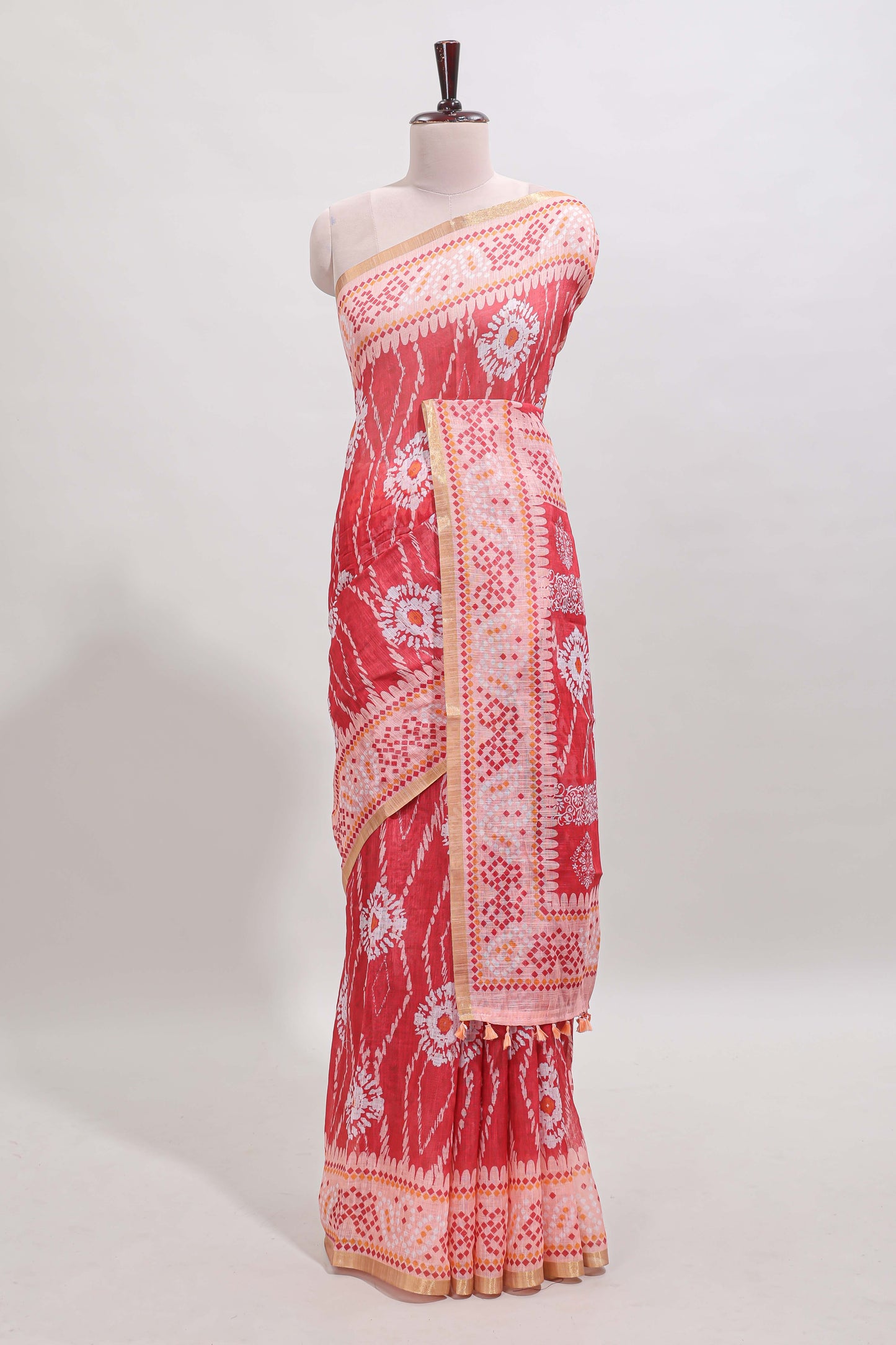 Pink shibori print motifs linen cotton saree with contrast border and matching blouse