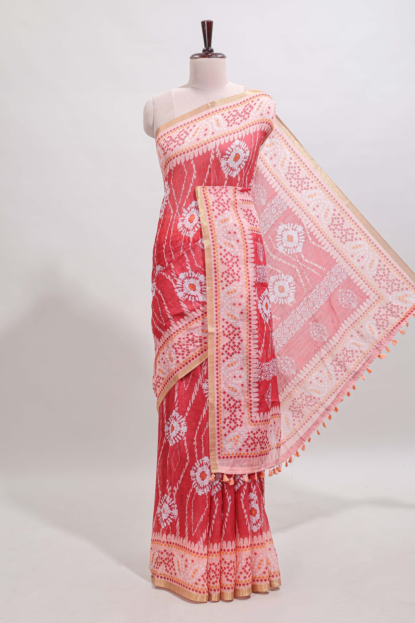 Pink shibori print motifs linen cotton saree with contrast border and matching blouse