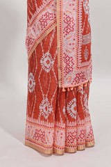 Orange shibori print motifs linen cotton saree with contrast border and matching blouse