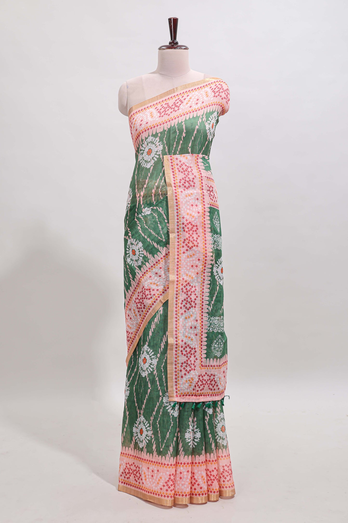 Green shibori print motifs linen cotton saree with contrast border and matching blouse