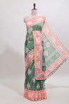 Green shibori print motifs linen cotton saree with contrast border and matching blouse