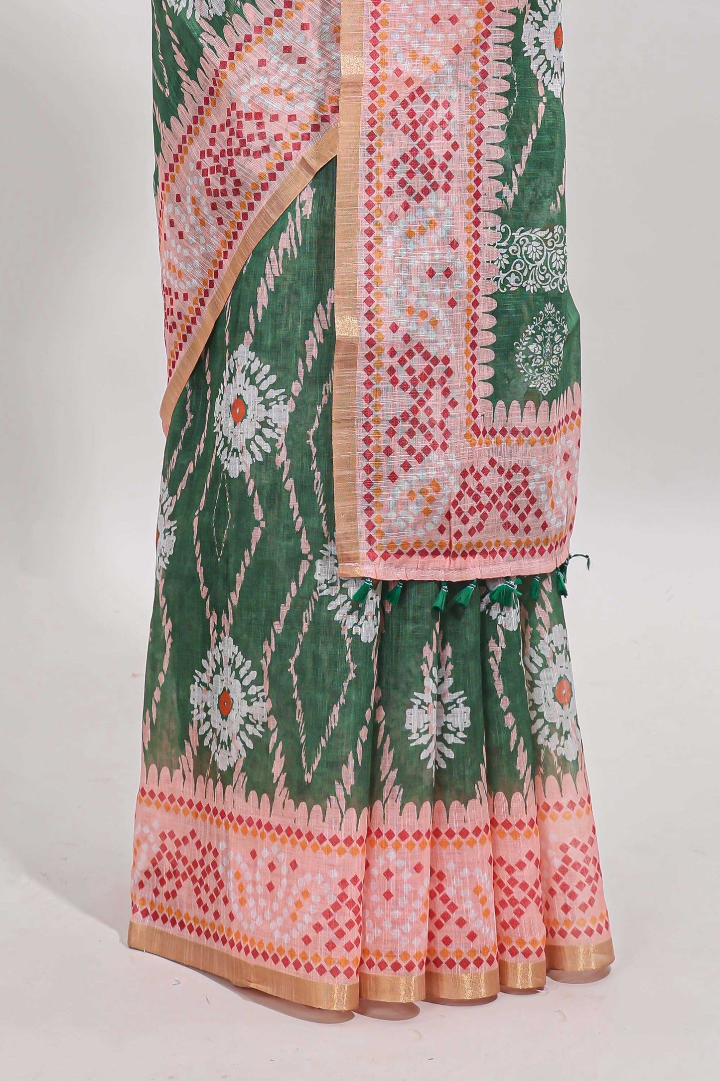 Green shibori print motifs linen cotton saree with contrast border and matching blouse