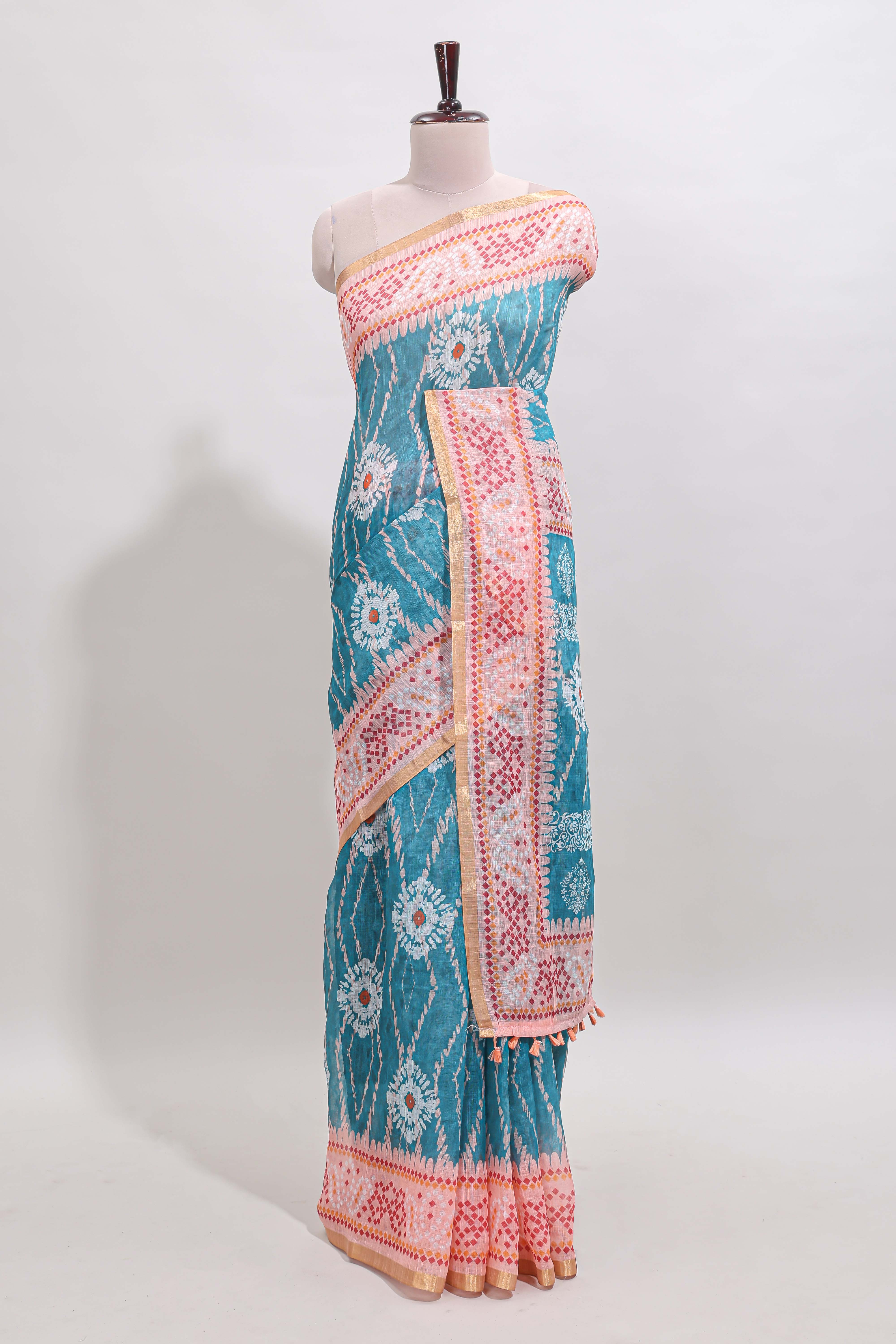 Blue shibori print motifs linen cotton saree with contrast border and matching blouse