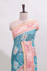 Blue shibori print motifs linen cotton saree with contrast border and matching blouse