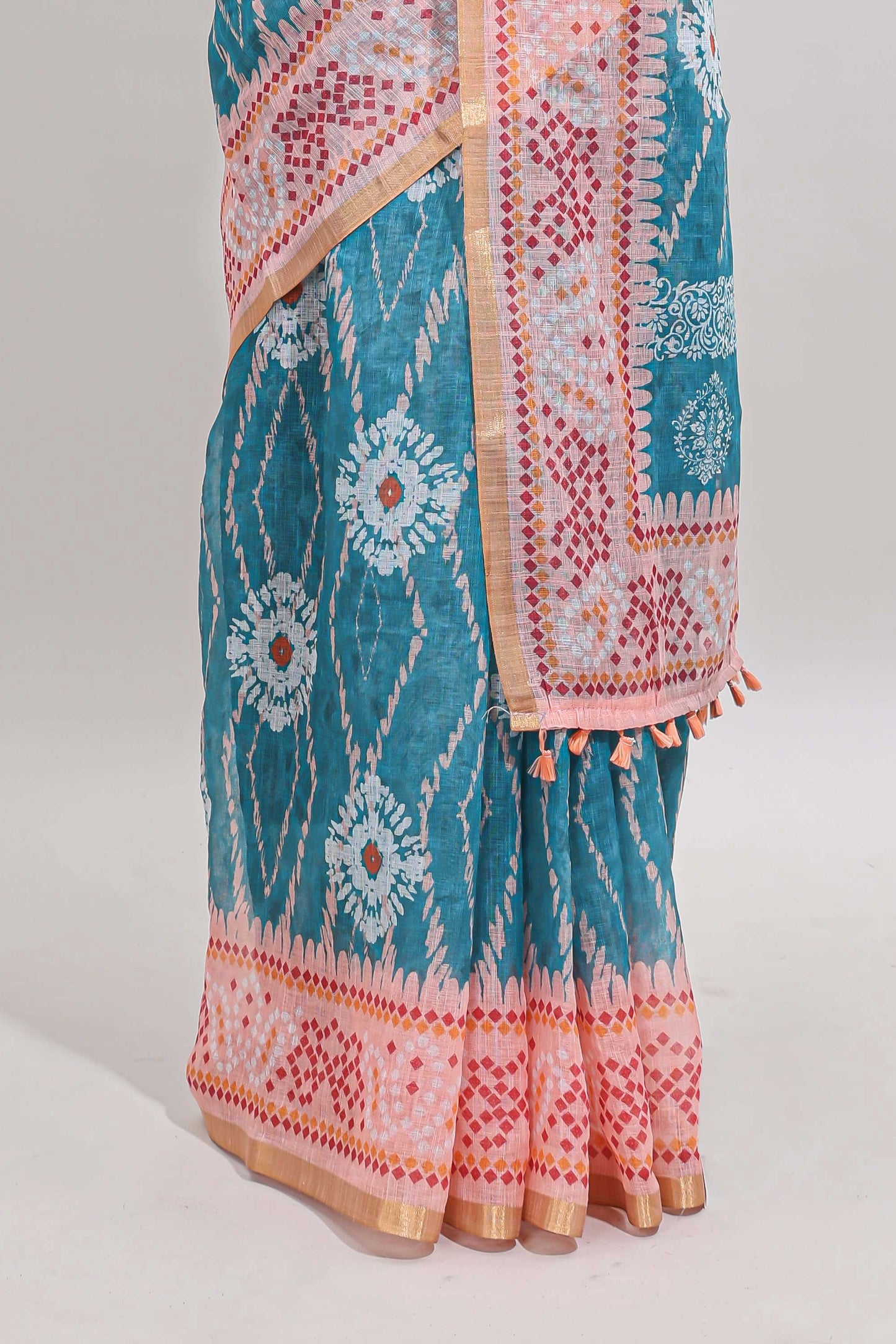 Blue shibori print motifs linen cotton saree with contrast border and matching blouse