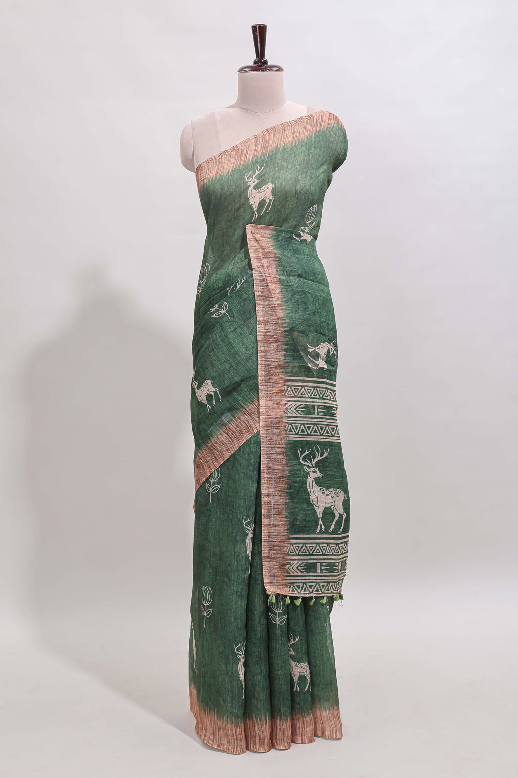 Green floral & deer design motifs linen cotton saree with contrast border and matching printed blouse