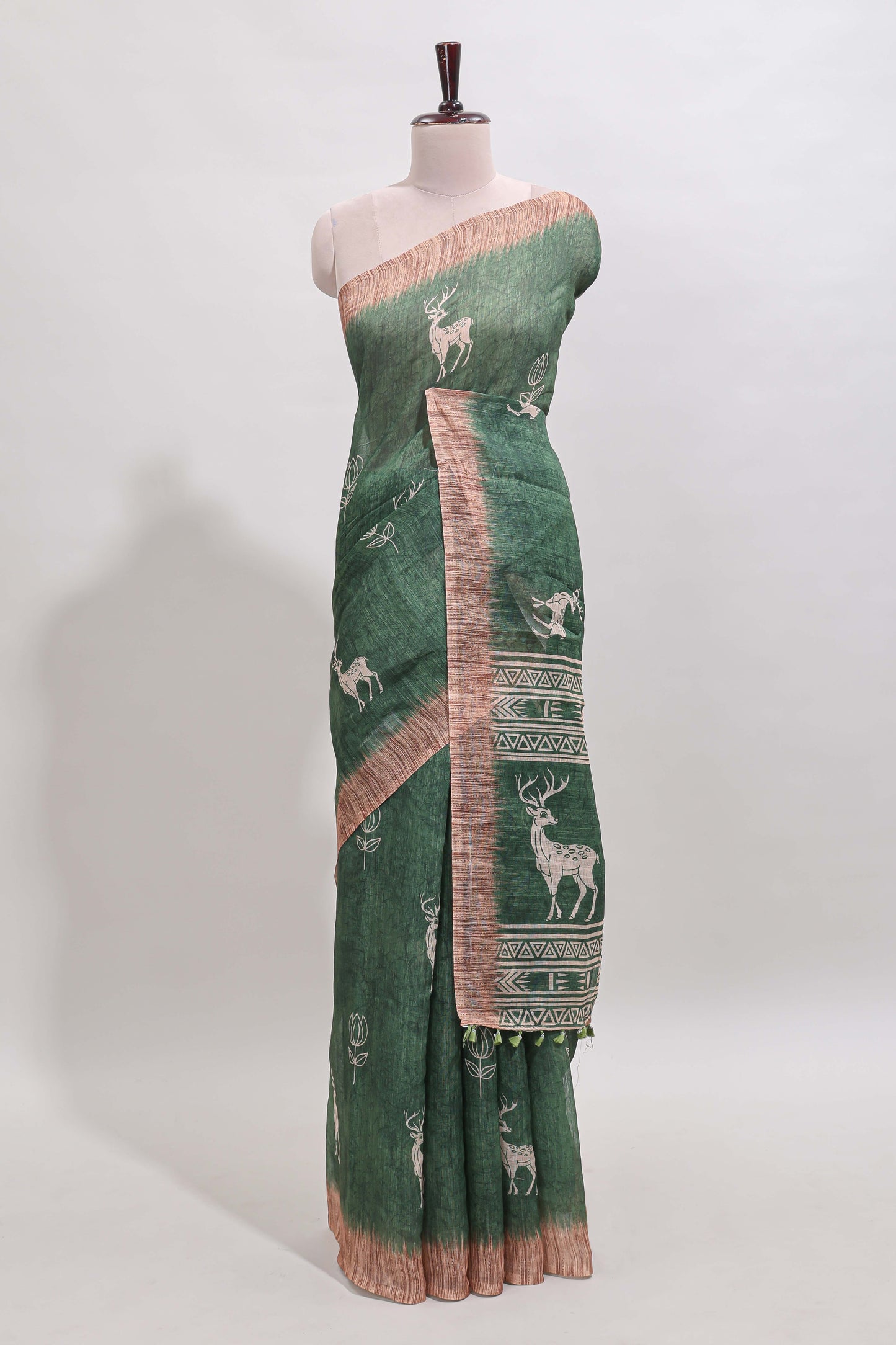 Green floral & deer design motifs linen cotton saree with contrast border and matching printed blouse