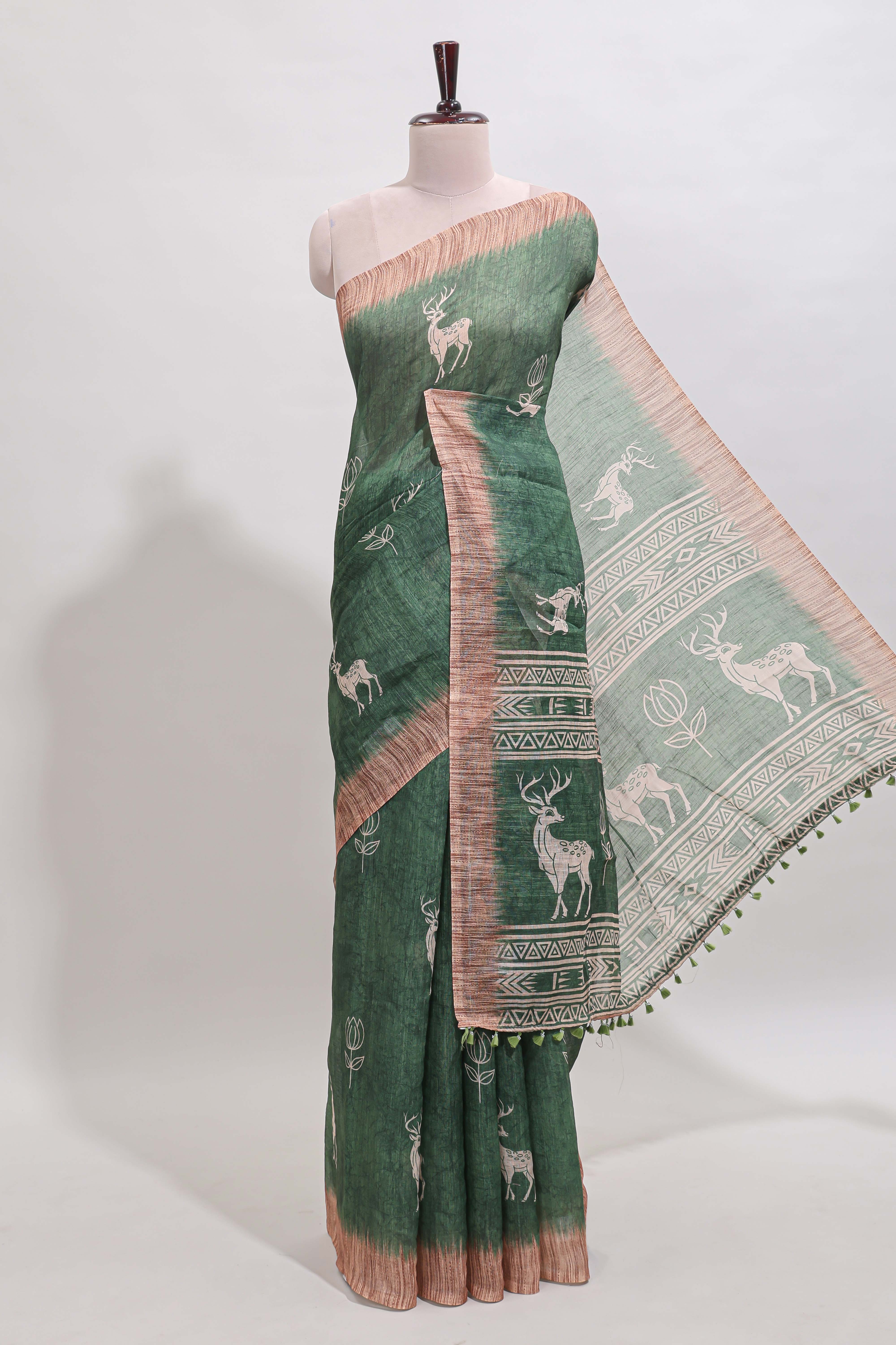 Green floral & deer design motifs linen cotton saree with contrast border and matching printed blouse