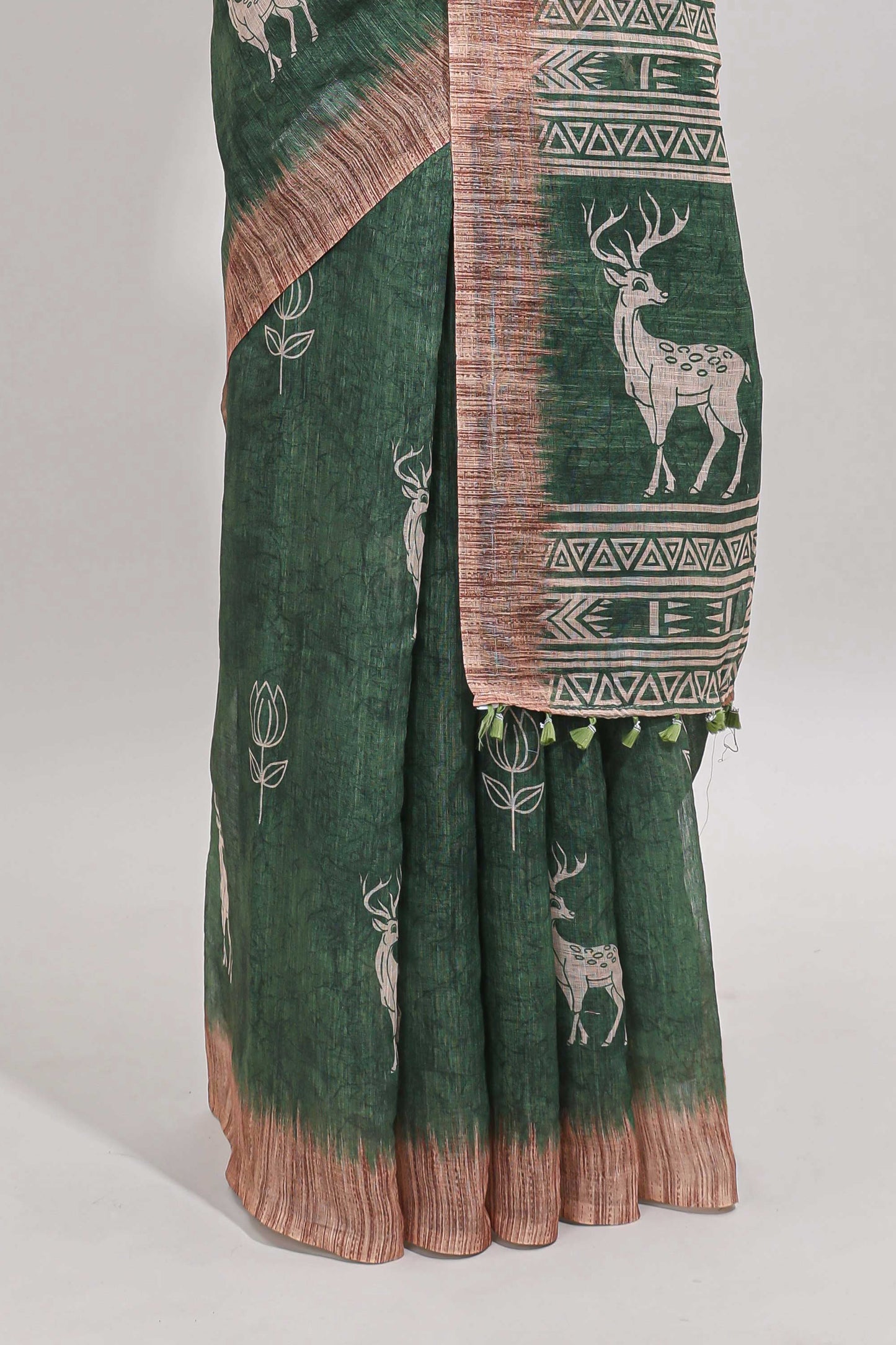 Green floral & deer design motifs linen cotton saree with contrast border and matching printed blouse