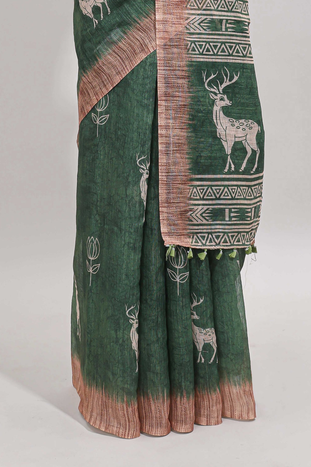 Green floral & deer design motifs linen cotton saree with contrast border and matching printed blouse
