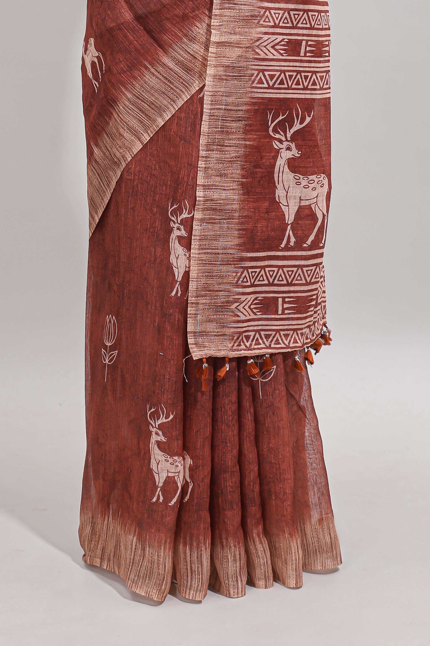 Orange floral & deer design motifs linen cotton saree with contrast border and matching printed blouse