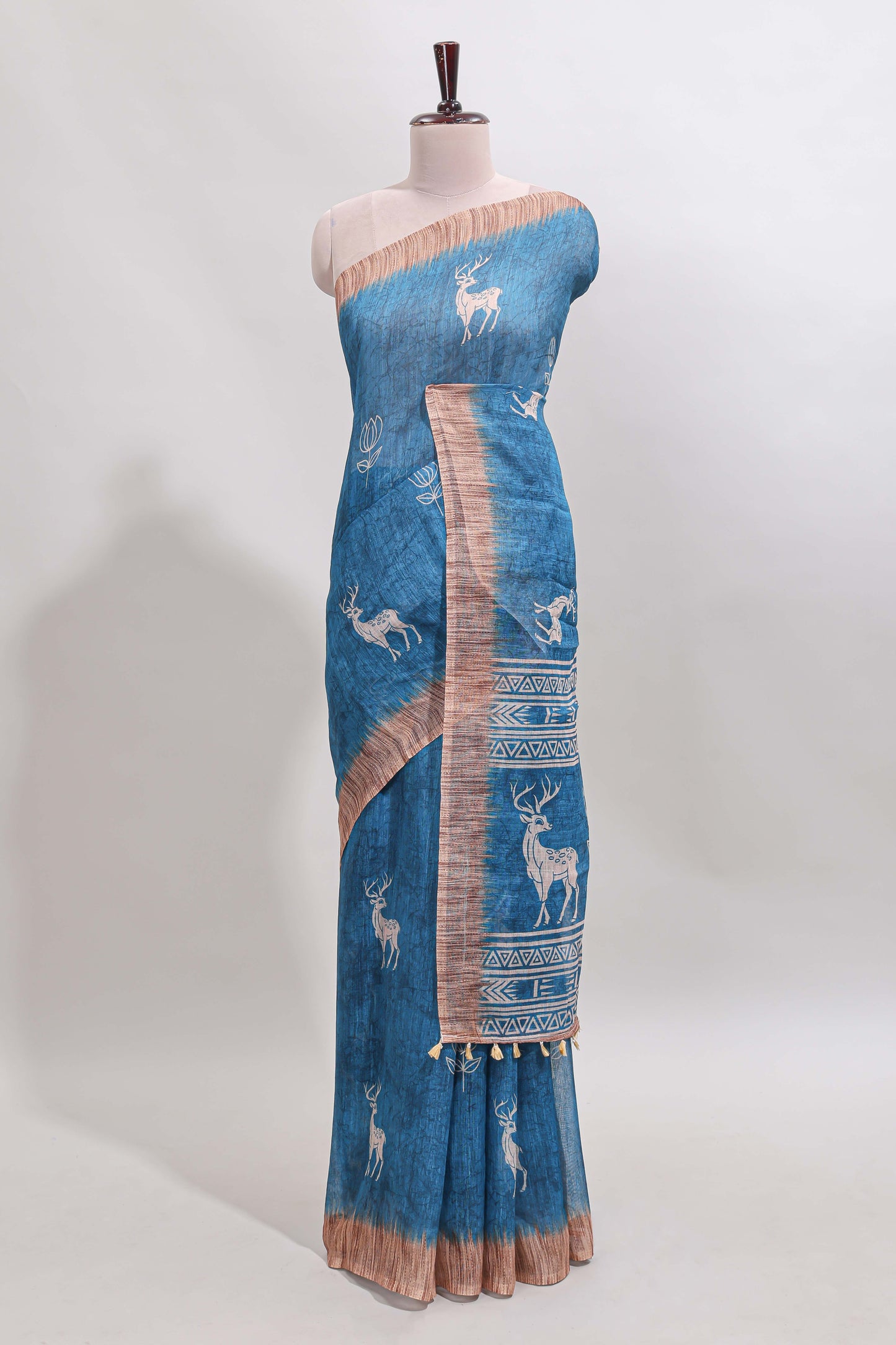 Blue floral & deer design motifs linen cotton saree with contrast border and matching printed blouse