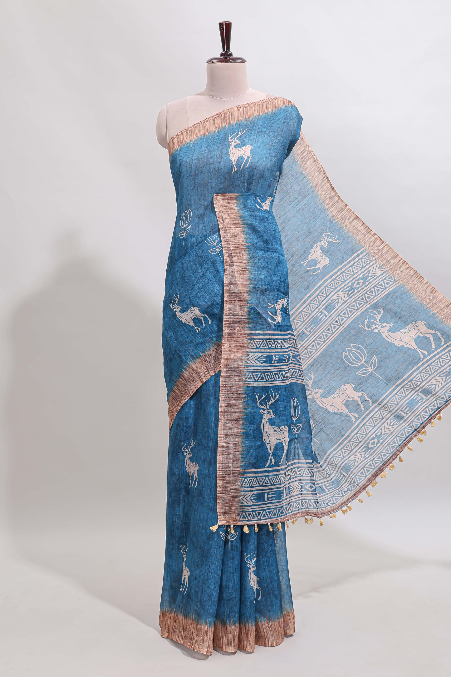 Blue floral & deer design motifs linen cotton saree with contrast border and matching printed blouse