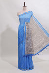 Blue checked geometric design butta linen cotton saree with self zari border and contrast blouse