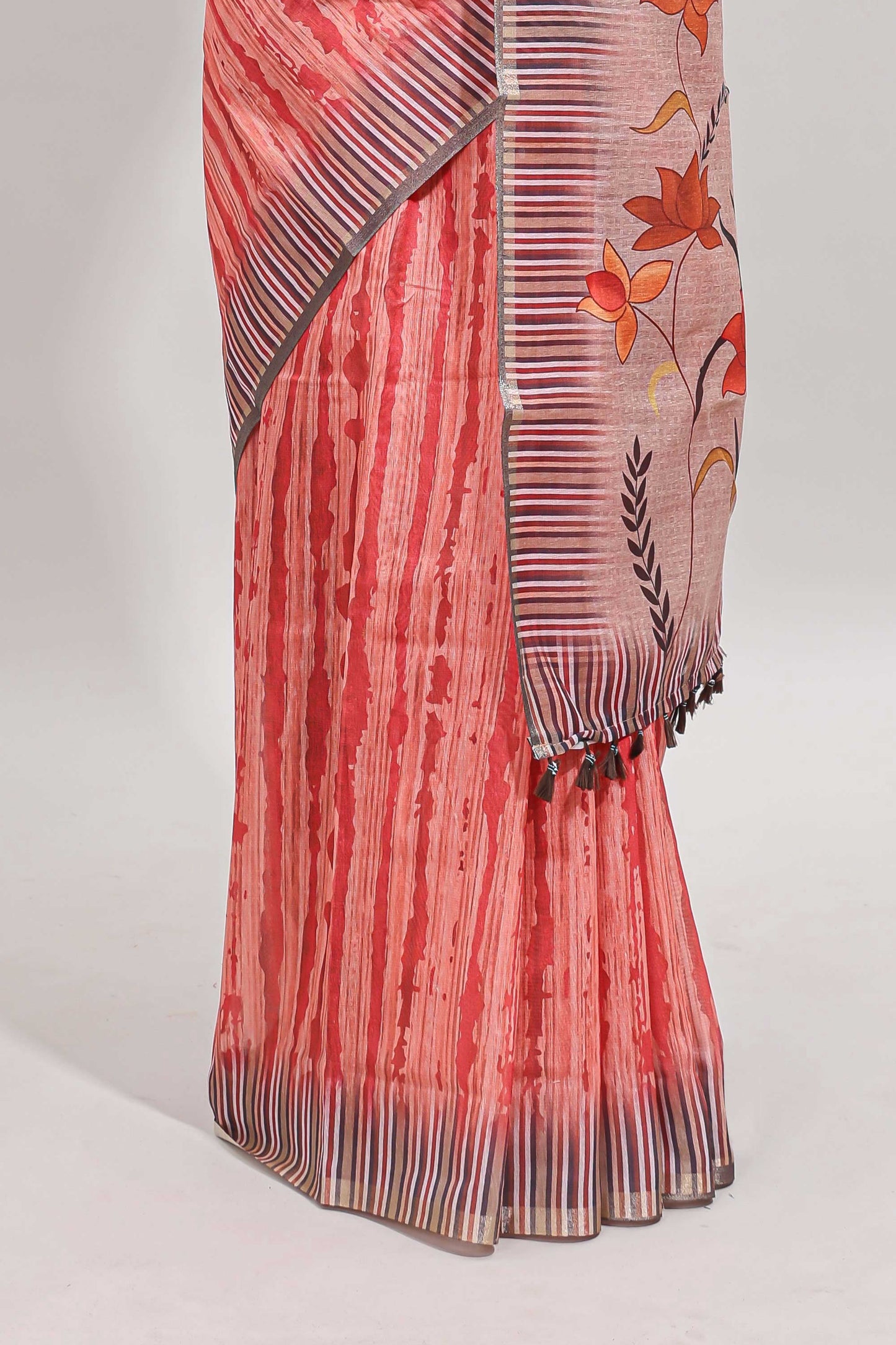 Orange striped digital print linen cotton saree with contrast border and floral design pallu