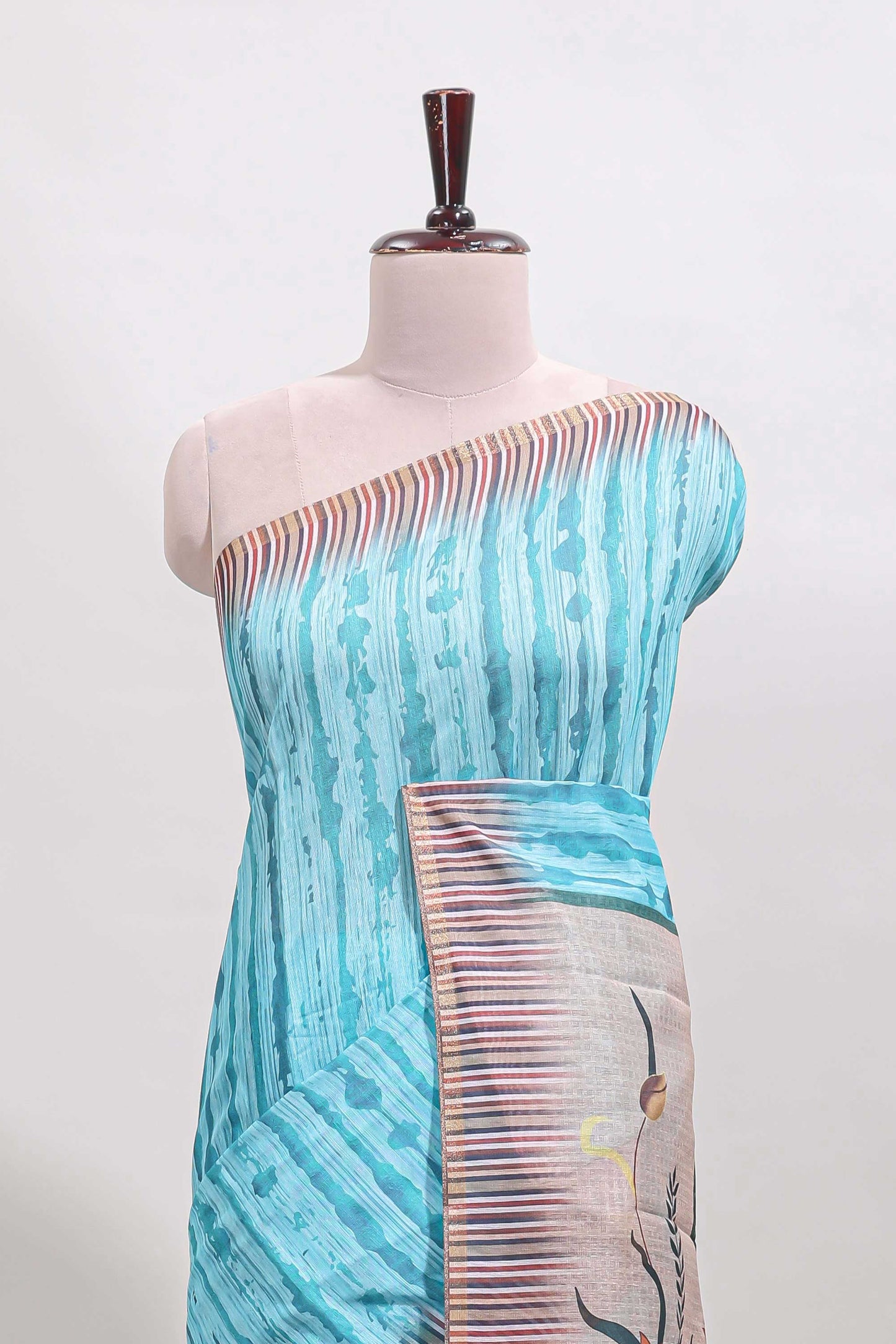 Turquoise blue striped digital print linen cotton saree with contrast border and floral design pallu