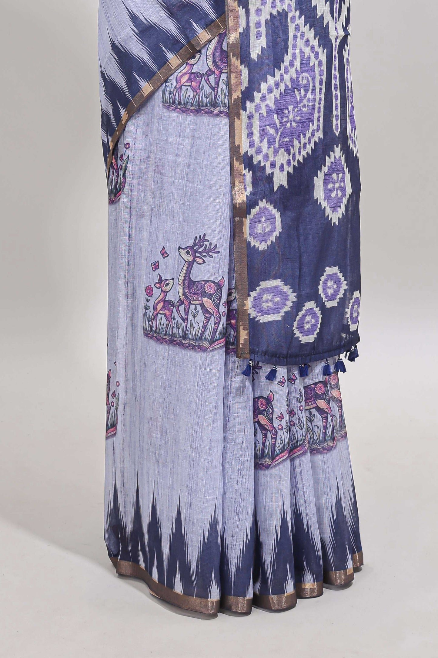 Lavender deer & fawn motifs linen cotton saree with self zari border and contrast ikkat style pallu