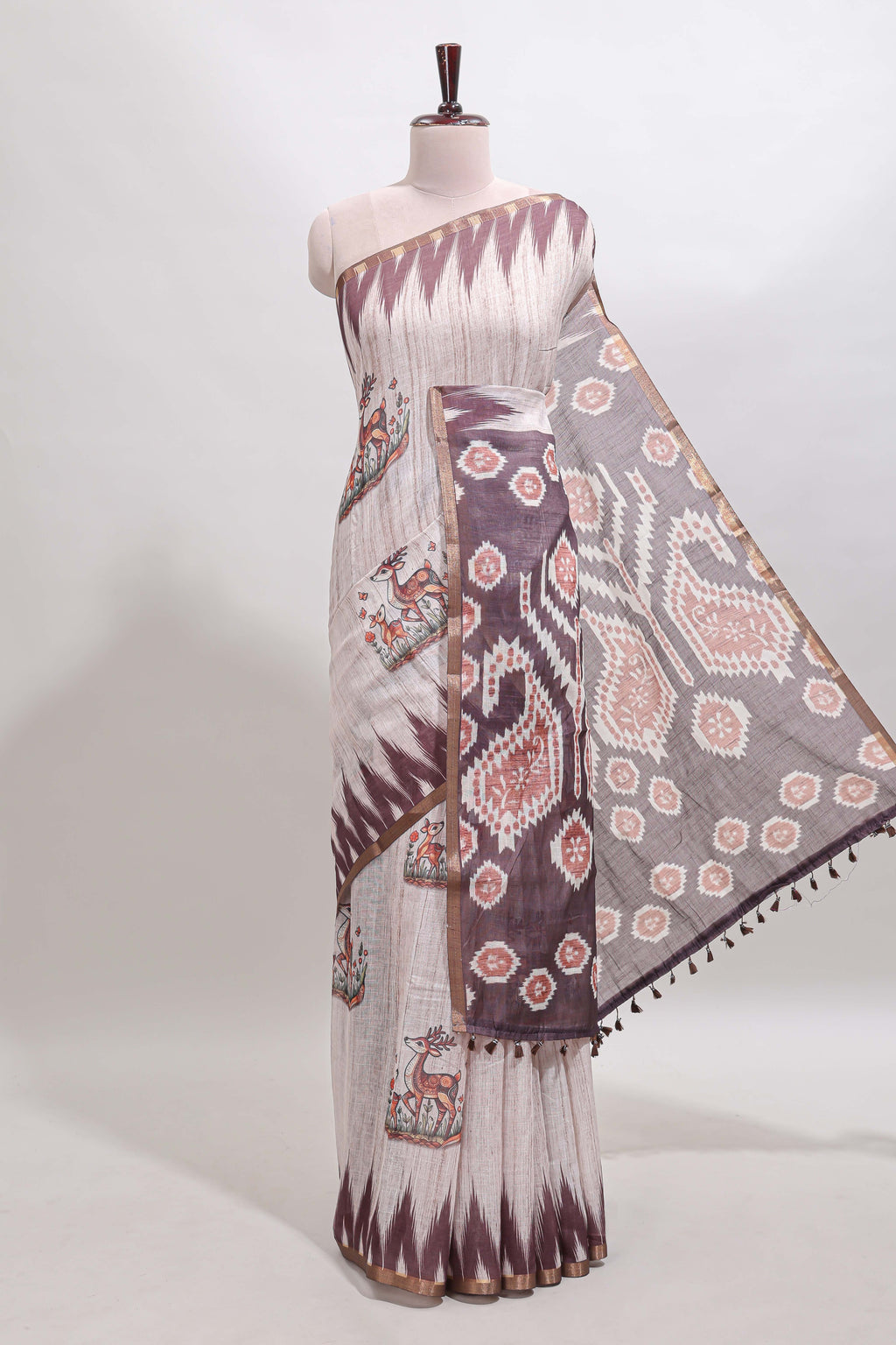 Brown deer & fawn motifs linen cotton saree with self zari border and contrast ikkat style pallu