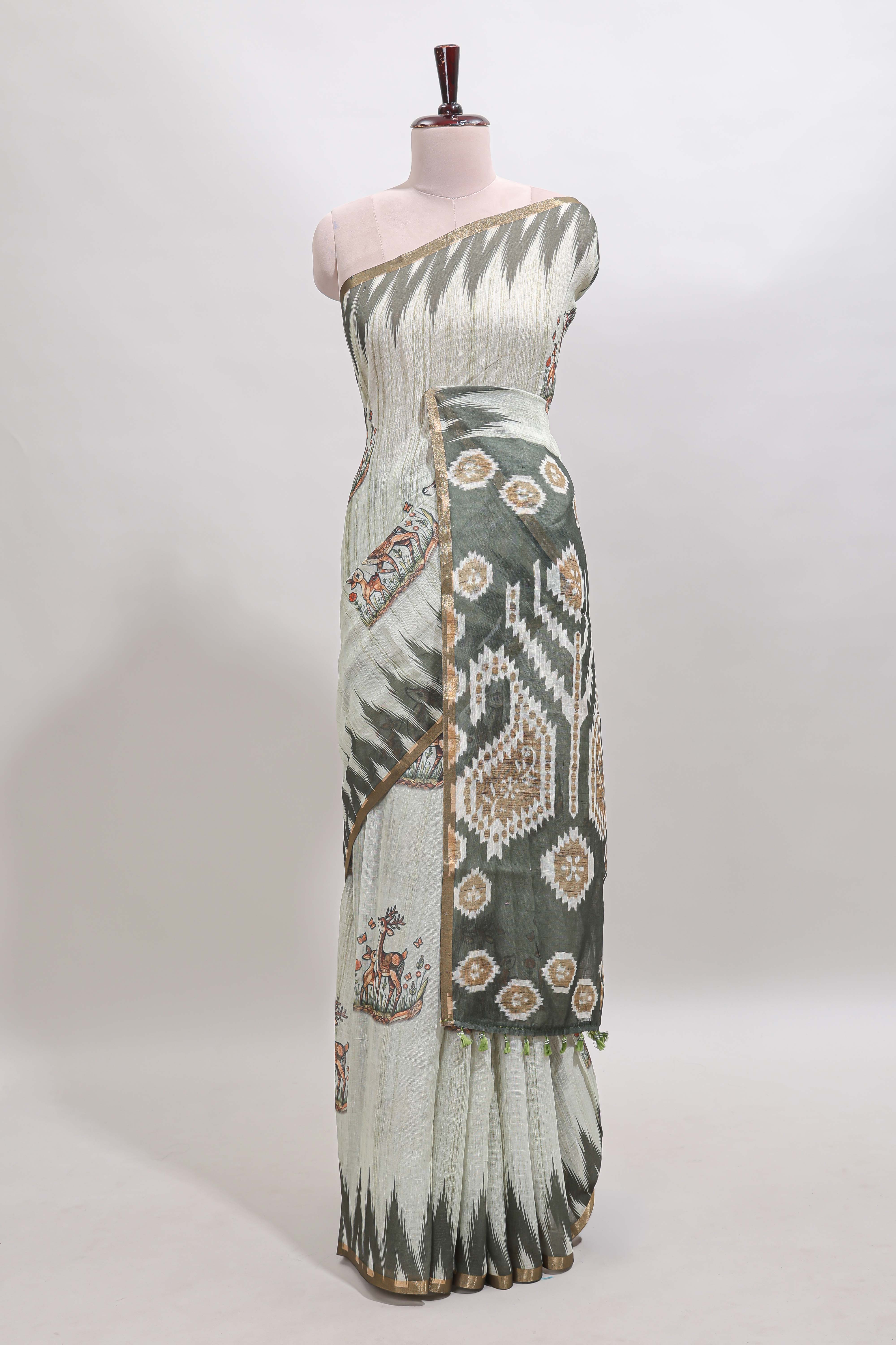 Green deer & fawn motifs linen cotton saree with self zari border and contrast ikkat style pallu