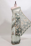 Green deer & fawn motifs linen cotton saree with self zari border and contrast ikkat style pallu