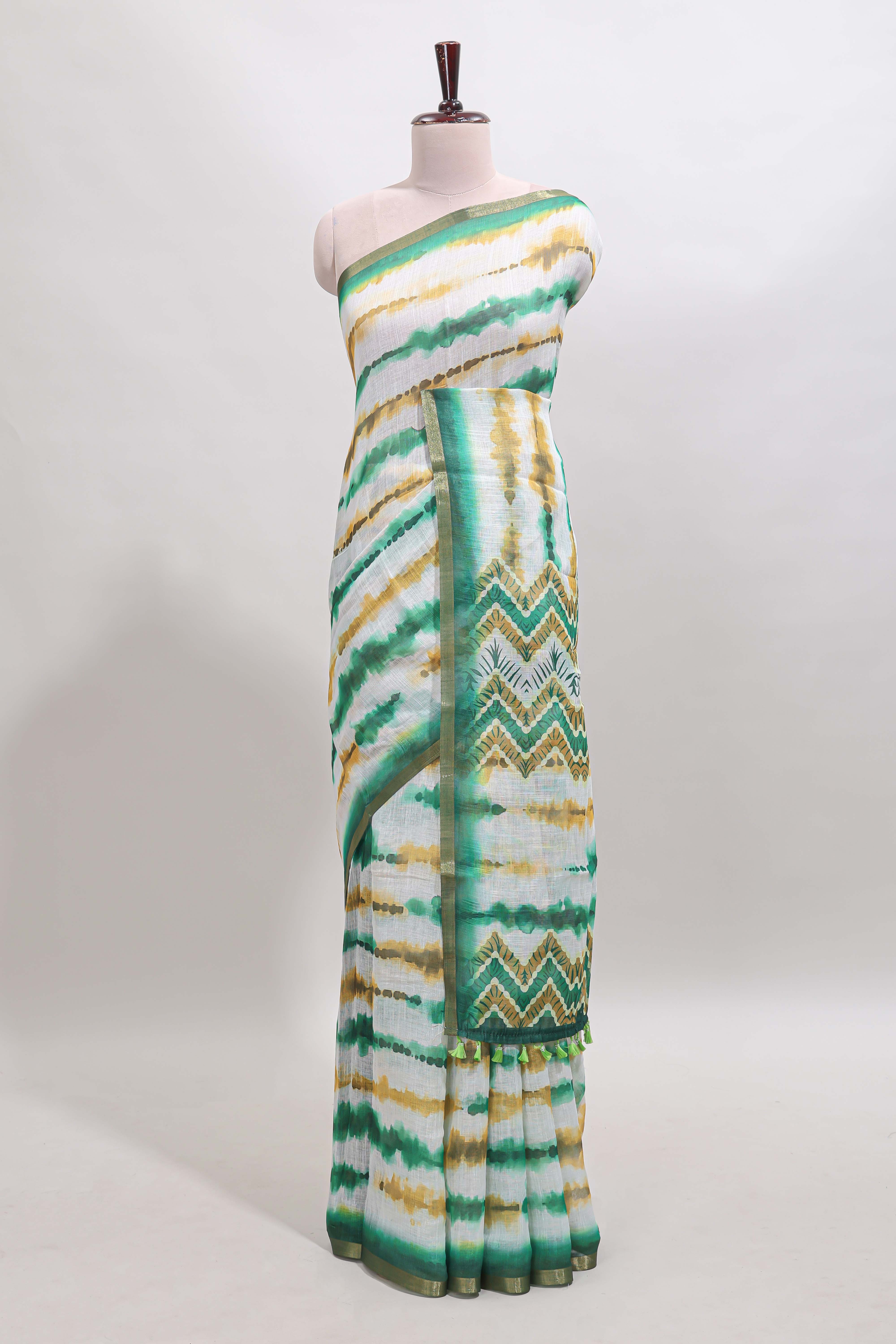 White tie & dye striped linen cotton saree with contrast zari border and printed blouse
