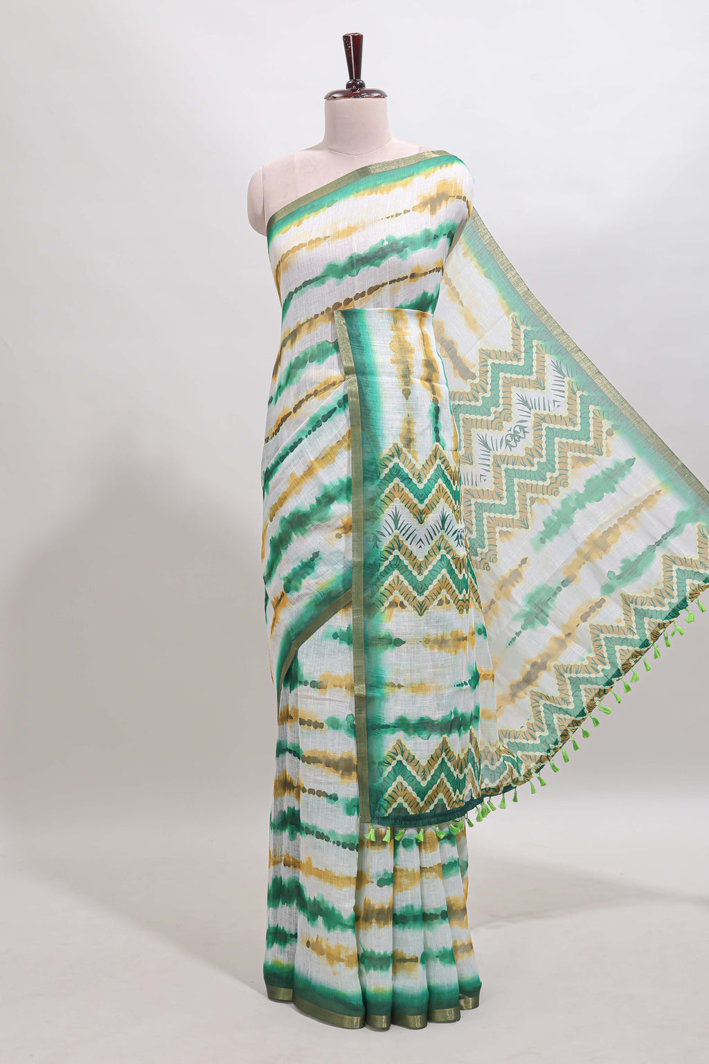 White tie & dye striped linen cotton saree with contrast zari border and printed blouse