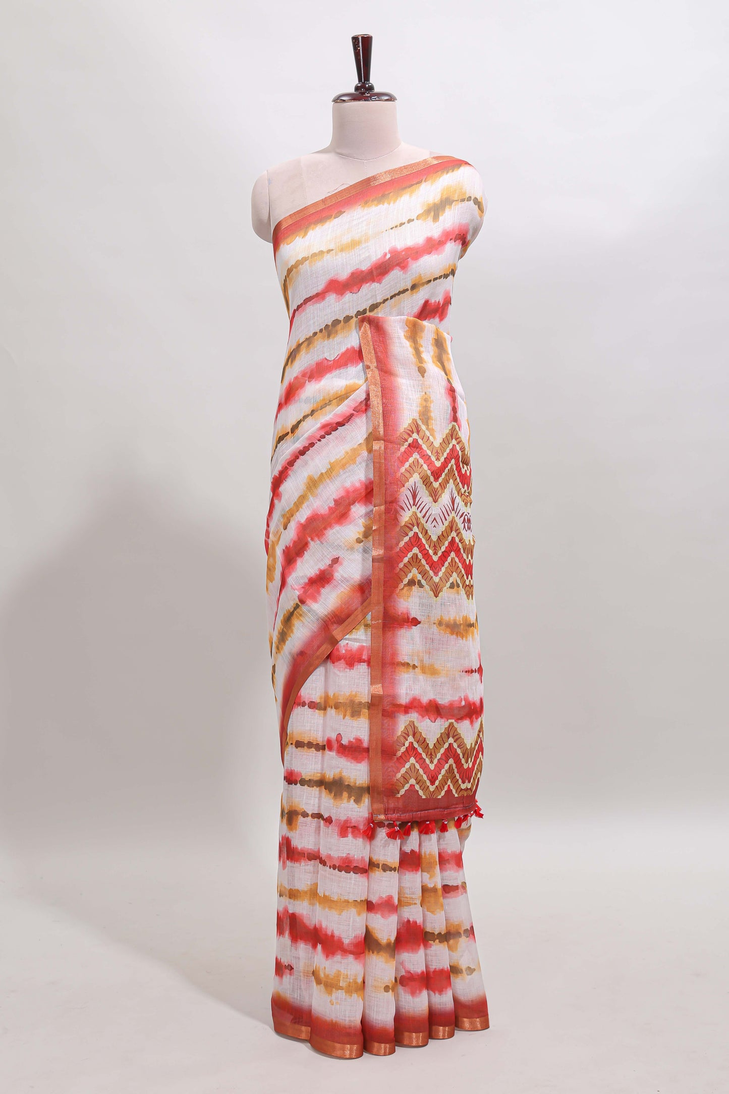 White tie & dye striped linen cotton saree with contrast zari border and printed blouse