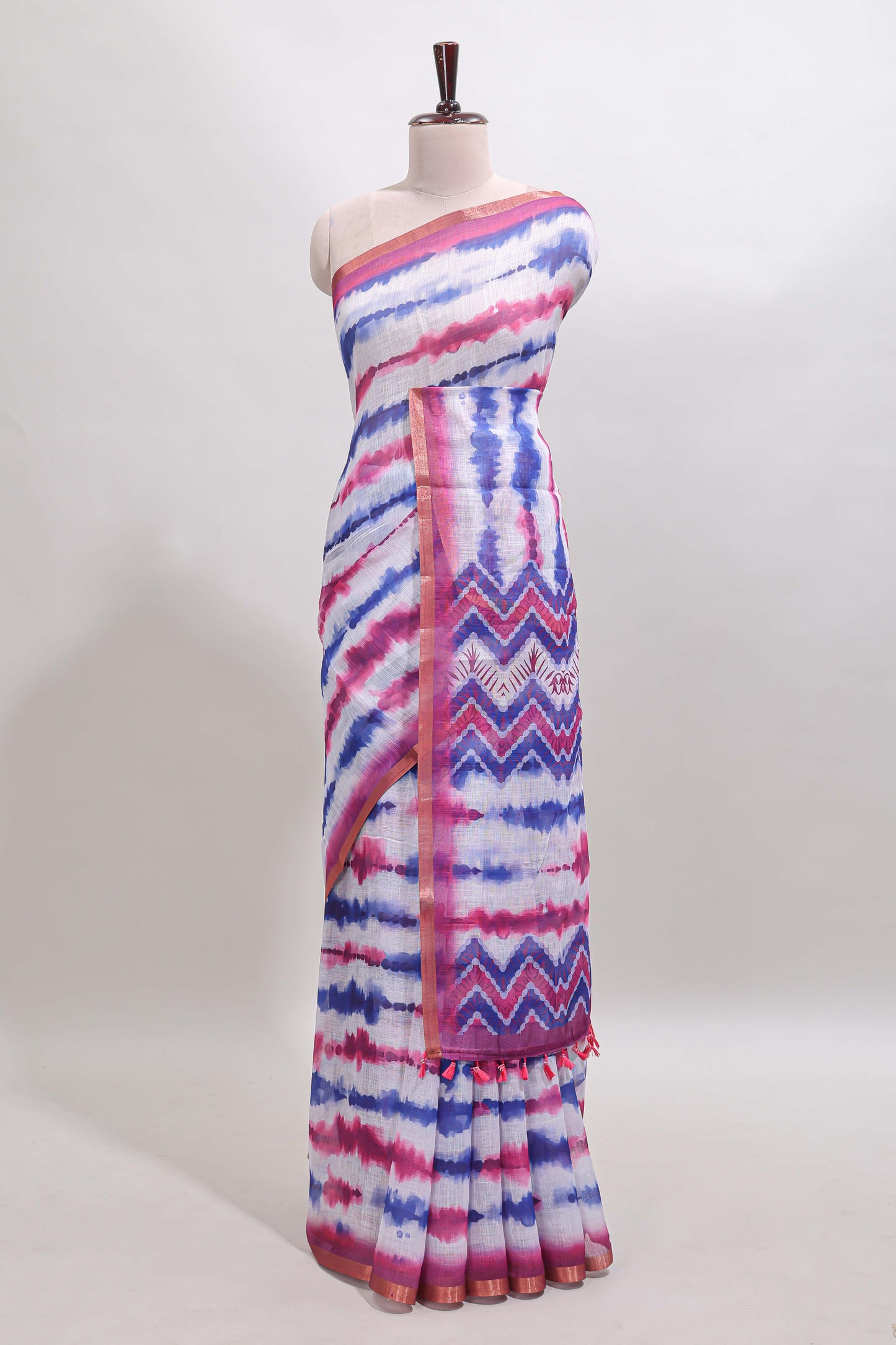 White tie & dye striped linen cotton saree with contrast zari border and printed blouse
