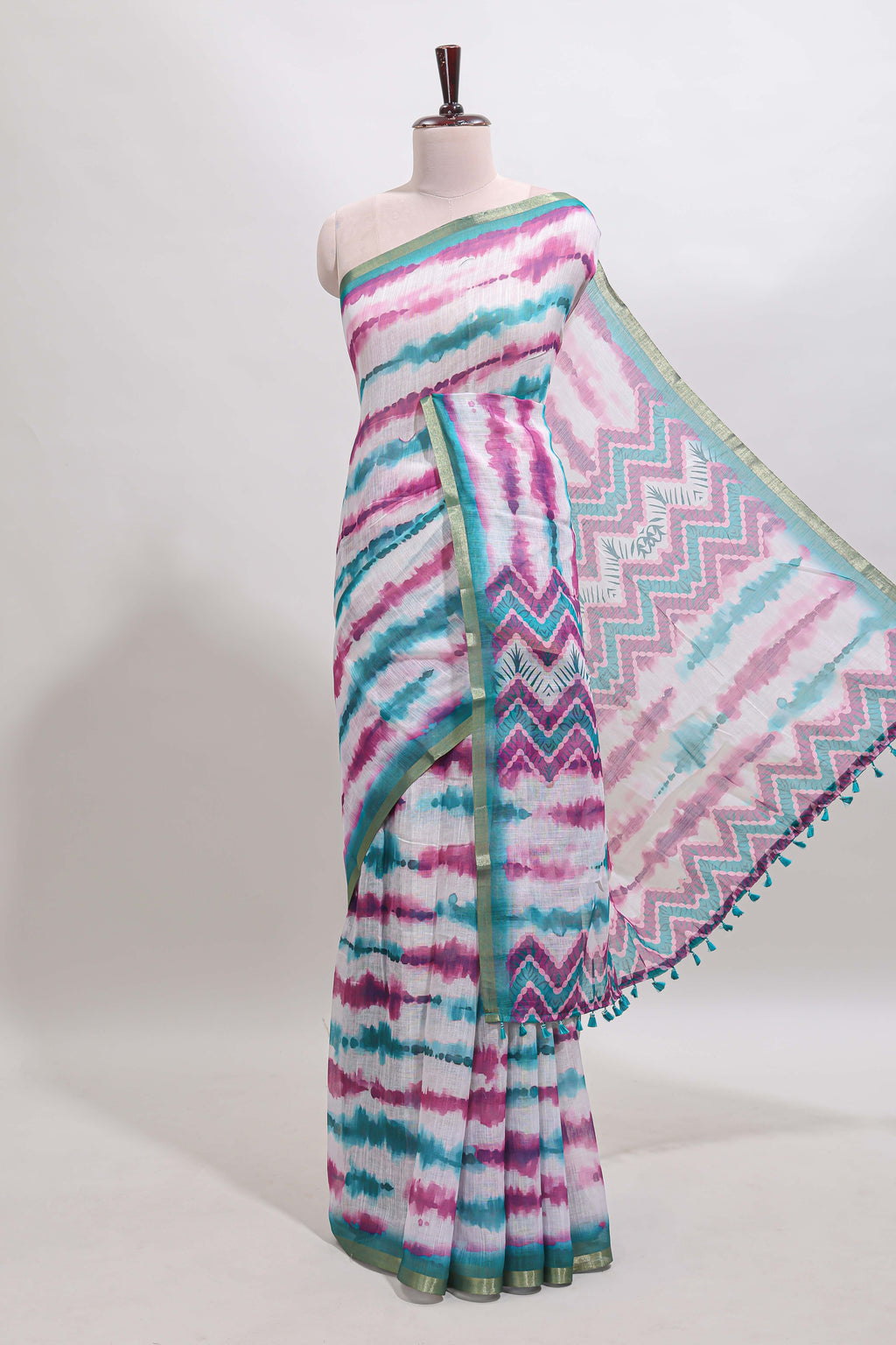 White tie & dye striped linen cotton saree with contrast zari border and printed blouse