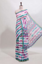 White tie & dye striped linen cotton saree with contrast zari border and printed blouse