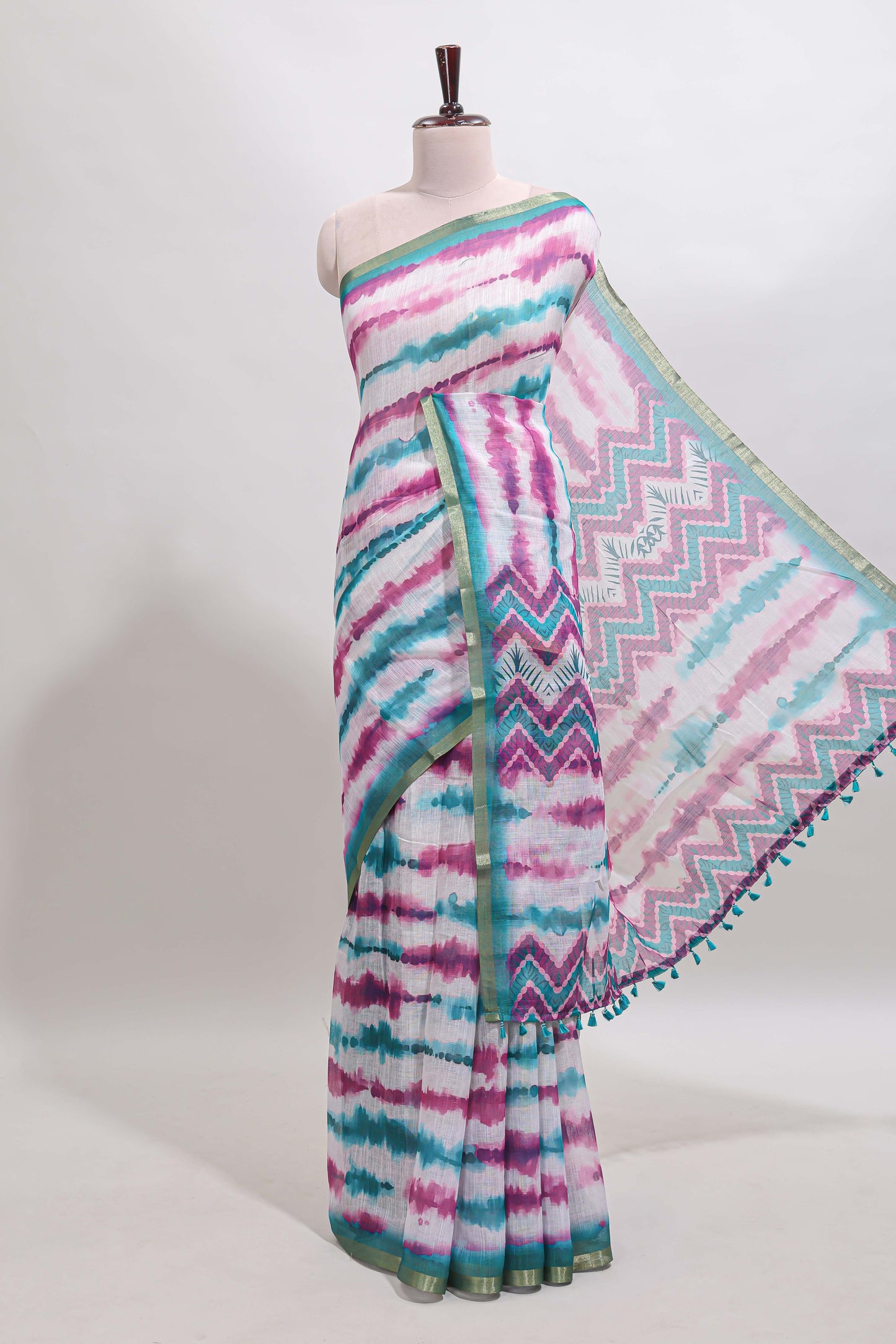 White tie & dye striped linen cotton saree with contrast zari border and printed blouse