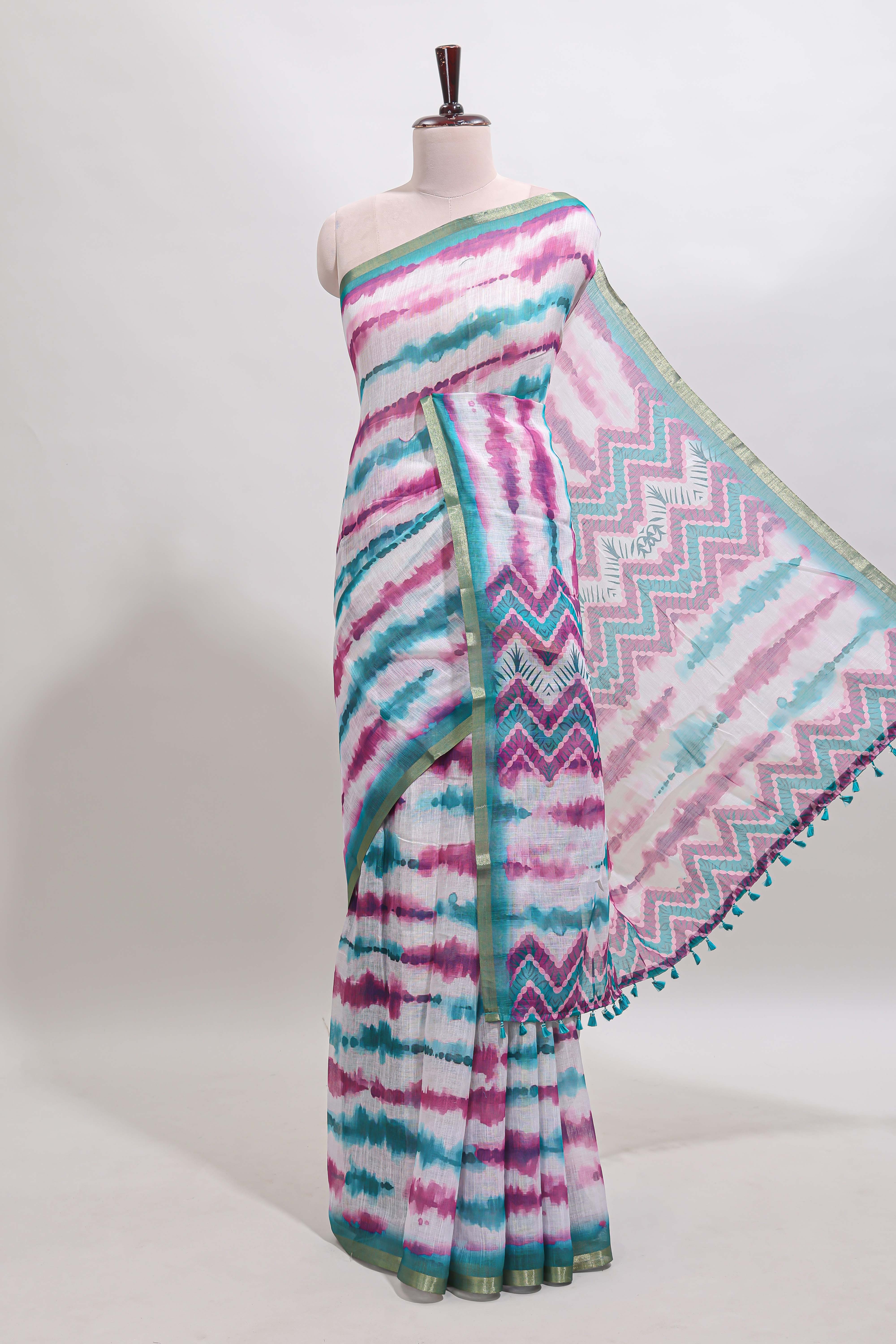 White tie & dye striped linen cotton saree with contrast zari border and printed blouse