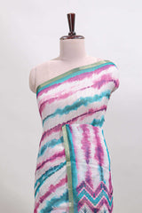 White tie & dye striped linen cotton saree with contrast zari border and printed blouse